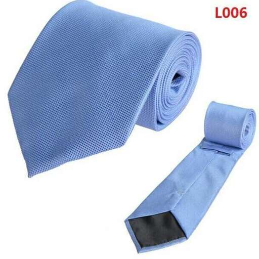 a blue tie with a clip on it