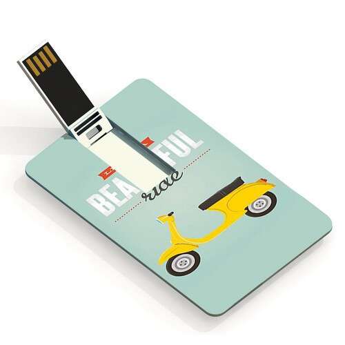 a computer mouse connected to a yellow car.