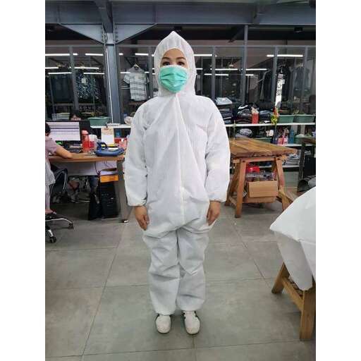 a person in a mask wearing a surgical mask.