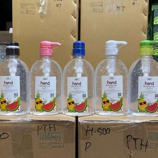 a bunch of bottles sitting on top of cardboard boxes.