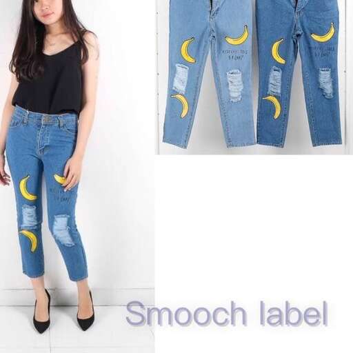 a girl in jeans and a yellow moon