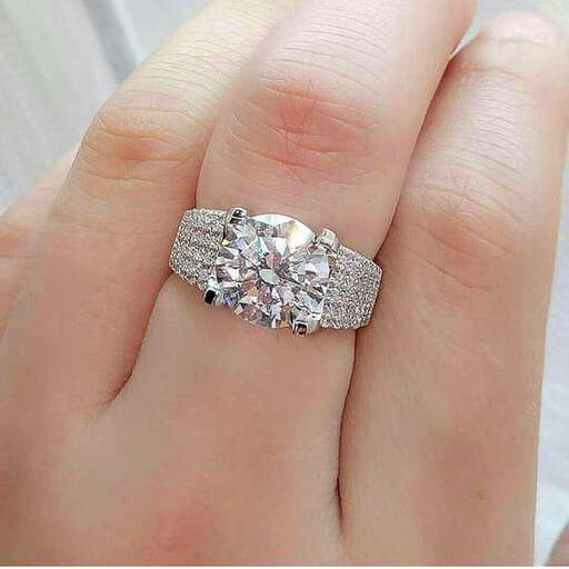 a close up of the engagement ring.