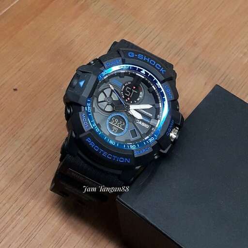 the watch is a watch that is on a table.