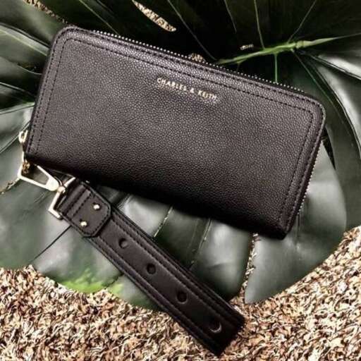 black leather wallet with a zipper