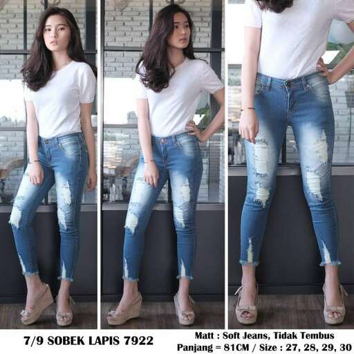 person in a white t - shirt and jeans