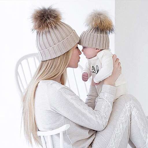 a mother and child in hats