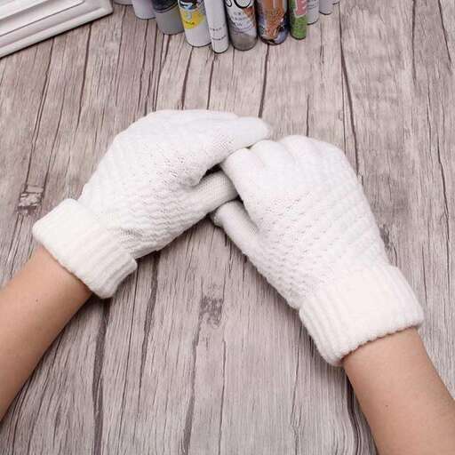 a pair of gloves with a pair of gloves on the hands.