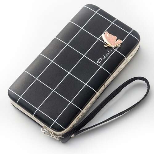 a small black and white purse with a pink flower on the front.