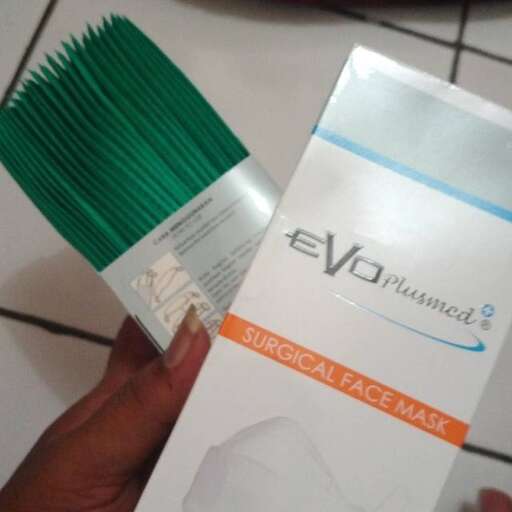 cleaning the floor with a brush