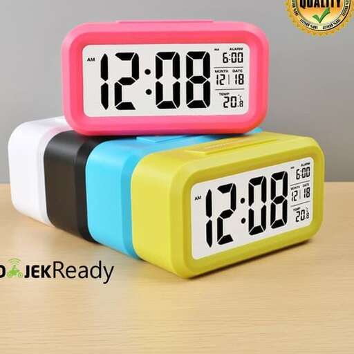 a clock with a colorful clock on top of it.