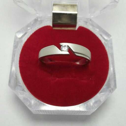 a ring made of red velvet with a silver band.