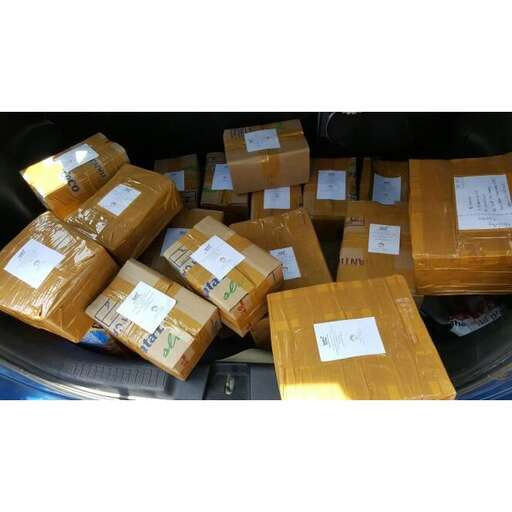 a pile of boxes of brown leather.