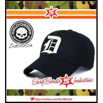 black baseball cap with white lettering and a black skull cap.