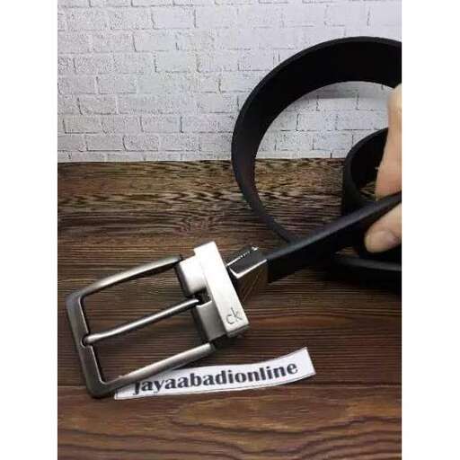 a pair of scissors with a cut out of it.