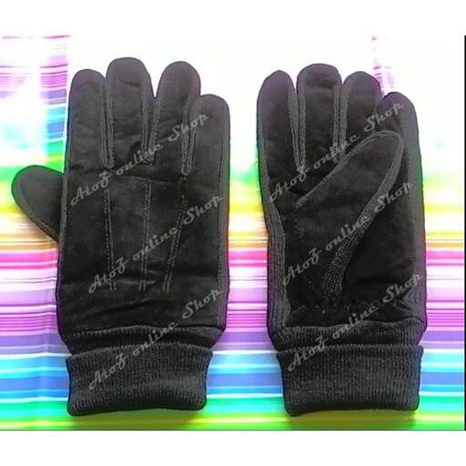 a pair of gloves that are on a table.