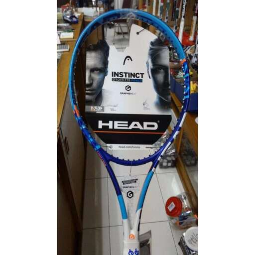 a tennis racket with a picture of a man on it.