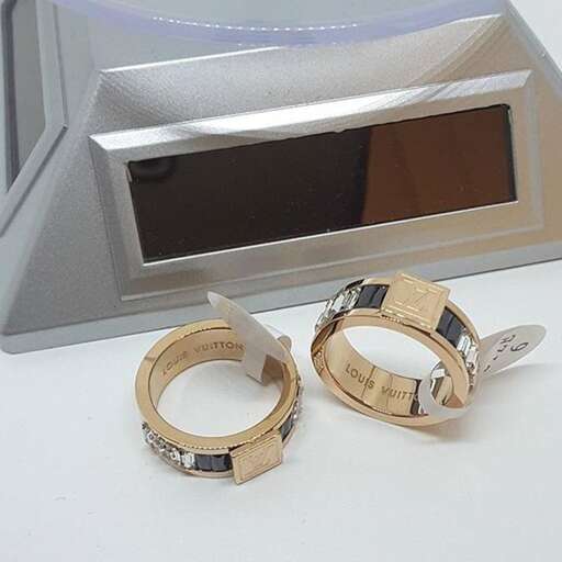 a couple of rings are sitting on a table