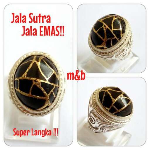 gold plated bracelet with black and gold leaf beads.