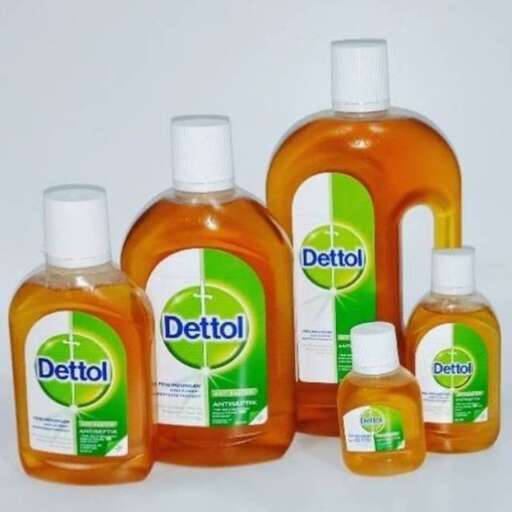 a group of bottles of cleaners with a white background.