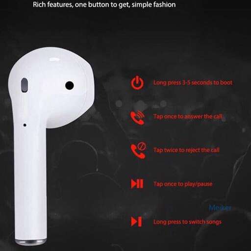 a white headphone with a button and buttons.