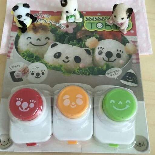 a box with a bunch of pandas in it