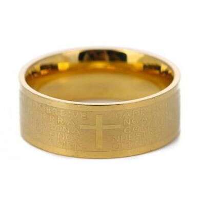 a yellow gold ring with a cross on the top.