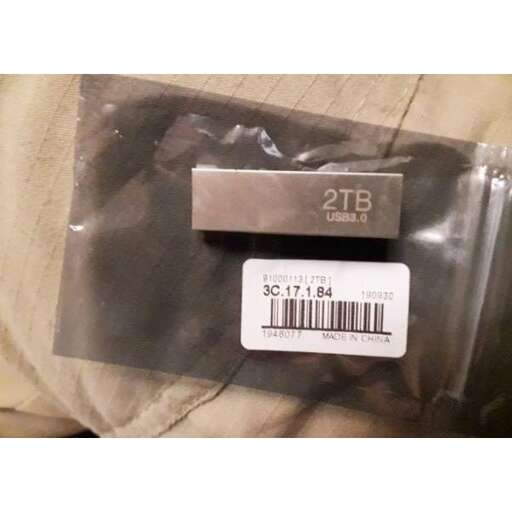 the back of the bag is a small plastic box with a label that says the number of the letters in the middle.