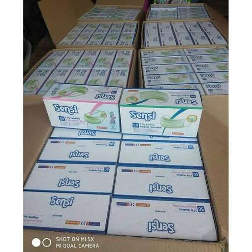 a stack of boxes of toilet paper