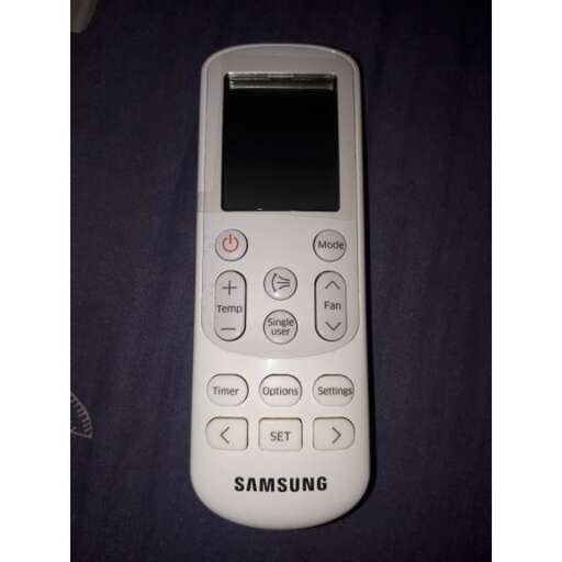 a close up of a cell phone on a table