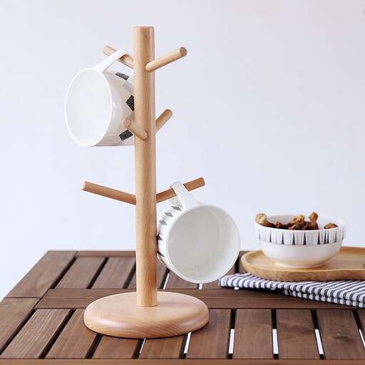 a table with a stand and plates on it