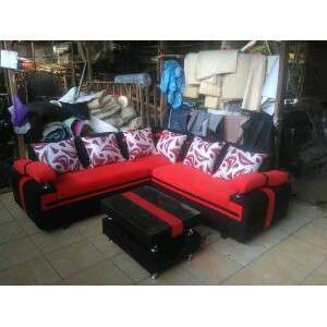a couch with a lot of pillows on it