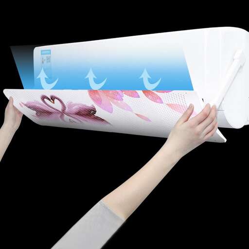 a hand holding a roll of paper with flowers on it.
