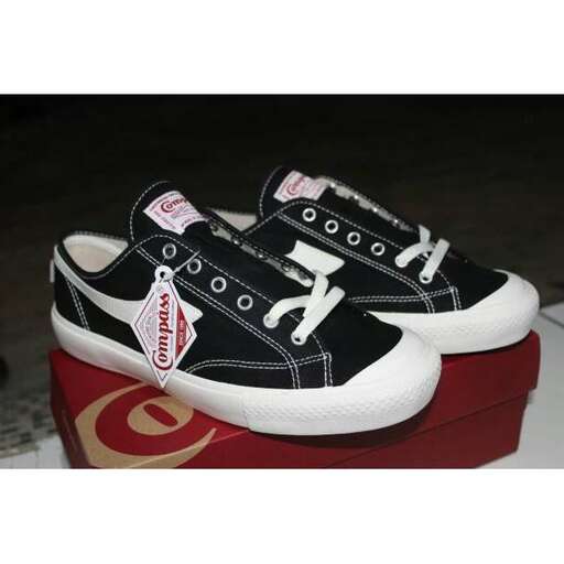 i love the idea of having a pair of shoes with a little bit of red on them.