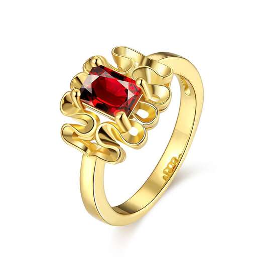 ring with a red stone