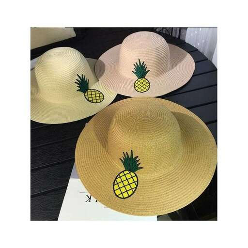 two hats with pineapples on them.