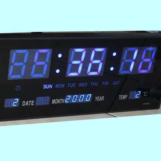 a digital clock with blue numbers and numbers