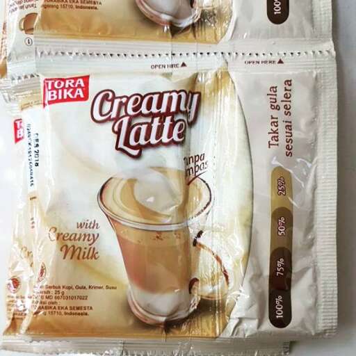 a package of milk and cream on a white surface.