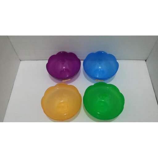 three colorful plastic balls in a box