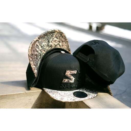 a hat and a hat are on a bench.