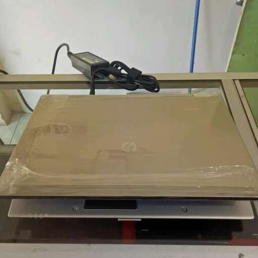 a computer monitor sitting on top of a table.