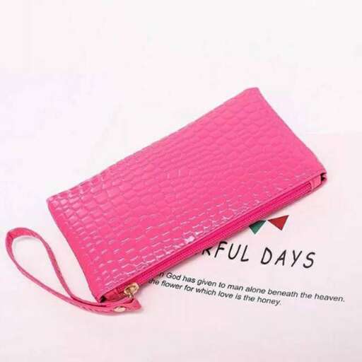 a small wallet with a pink strap.