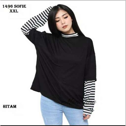 black and white striped long sleeve shirt with striped sleeves and a striped long sleeve shirt underneath.