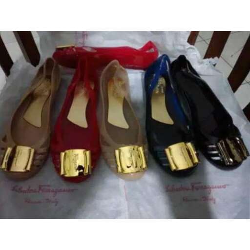 a pair of shoes for a baby boy.