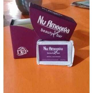 a small purple box with a picture of a desert on it.