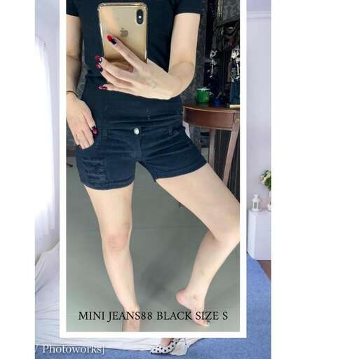 a pair of shorts with a black top and a short skirt.