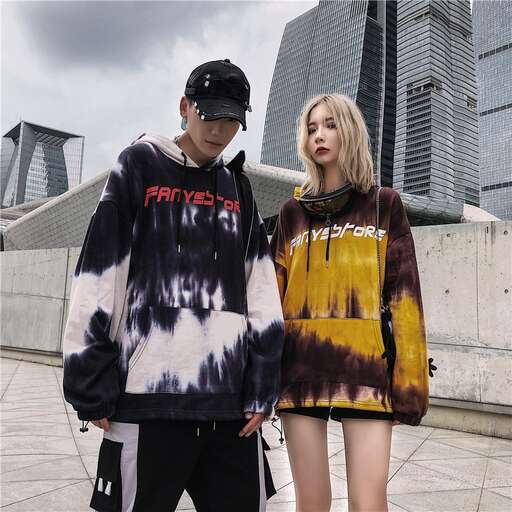 a boy and girl in front of the city