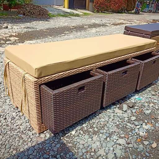a bed with a mattress on it sitting on the ground.