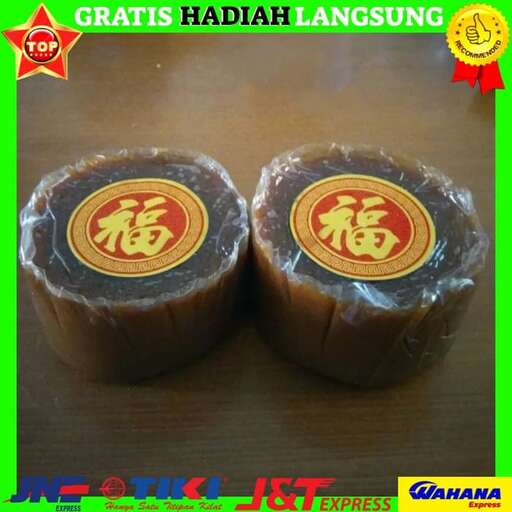 a traditional chinese style cake in a plastic bag.