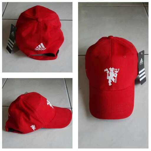 a red baseball cap with a white logo on it.