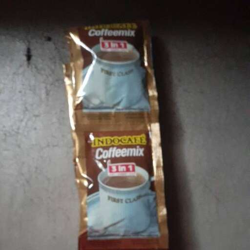 a box of coffee sitting on top of a table.